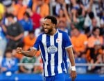 Deportivo thrashes Valencia 3-1 for first LaLiga win