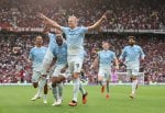 With ten players, Manchester City secures derby at Old Trafford